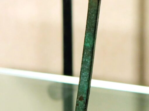 Manico di bronzo a forma di testa di cigno